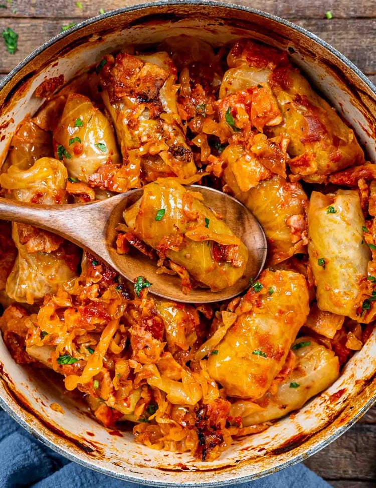 freshly baked romanian cabbage rolls in a dutch oven.