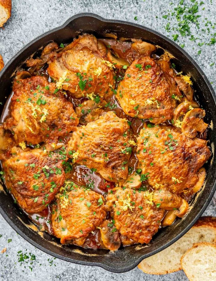 freshly made chicken marengo in a black cast iron skillet.