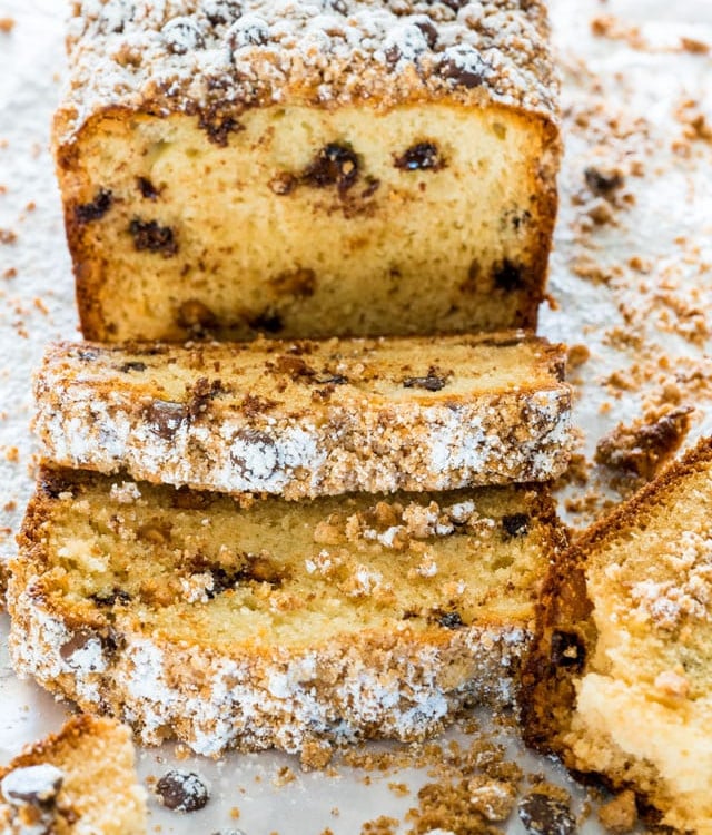 side view shot of a sliced chocolate peanut butter chip crumb cake