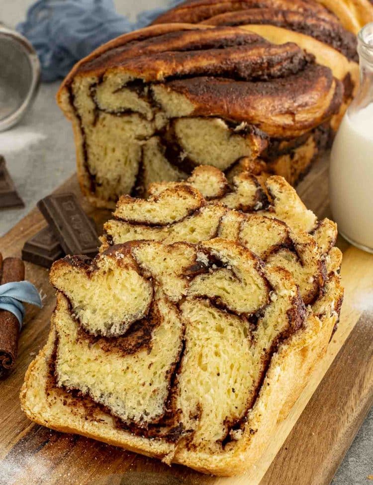 sliced chocolate bubka on a cutting board.