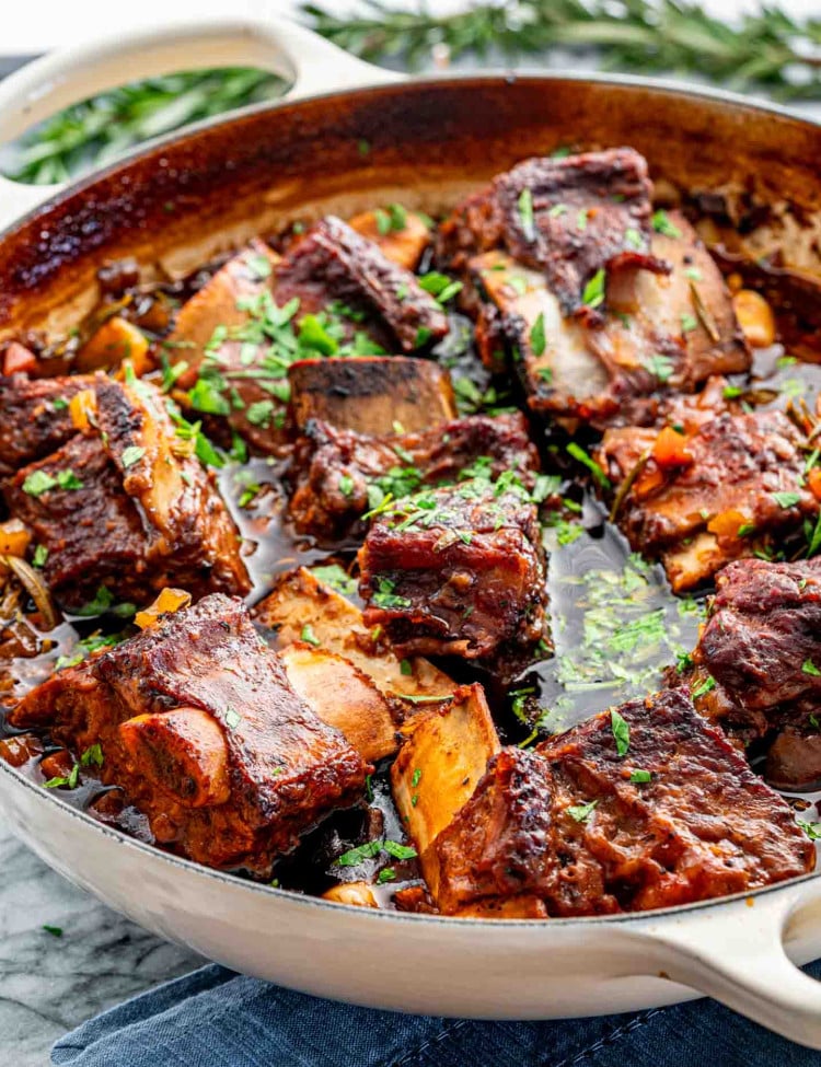 guinness braised short ribs in a dutch oven fresh out of the oven.