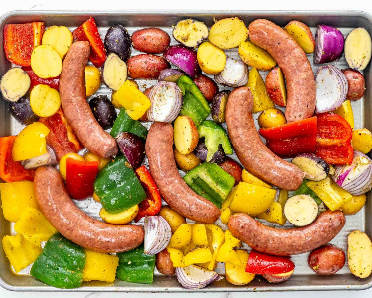 process shots showing how to make sausage and potato sheet pan dinner.